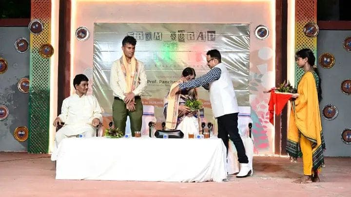 Eminent lady artist Basanta Kumari Samanta lighting the ceremonial lamp before Lord Jagannatha at the From Scrap to Creation paper collage programme of GCAC Khallikote - Image 3