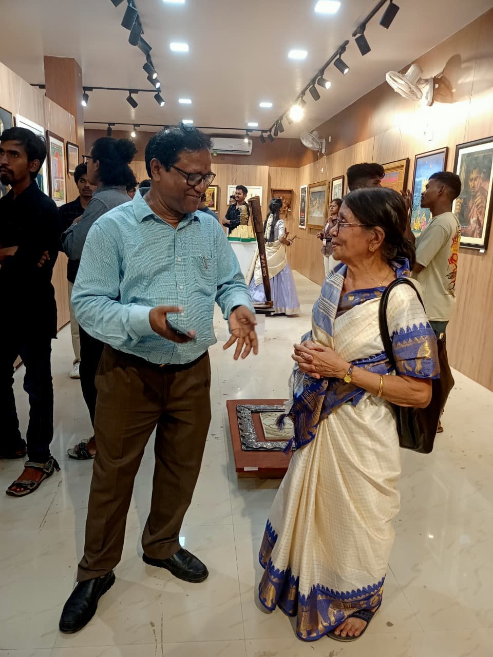 Artist Basanta Kumari Samanta in conversation with Utkal University of Culture Professor Surendra Swain at the GCAC Exhibition Hall